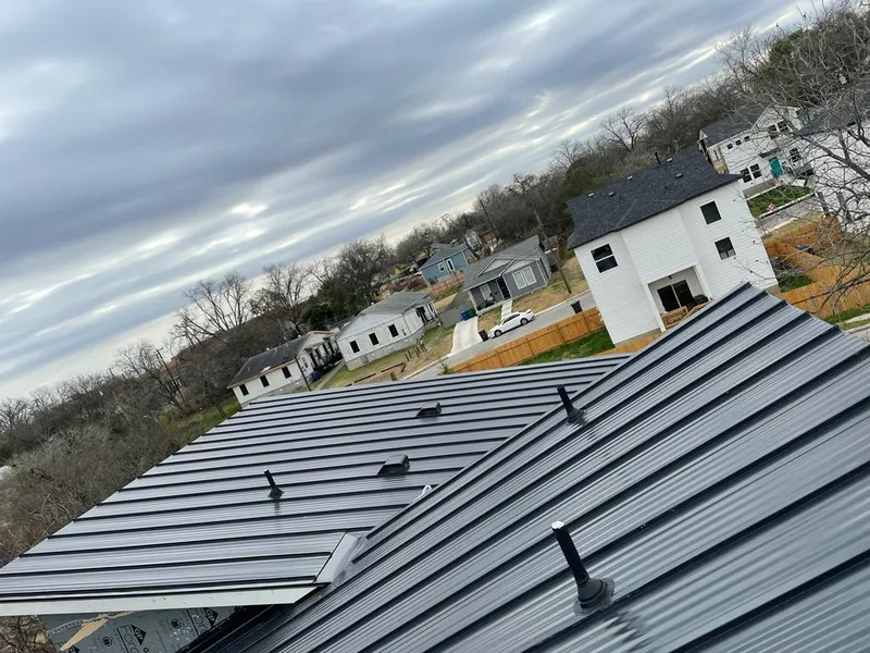 Standing seam metal roof panels with vents for Skylight Repair in The Crossings